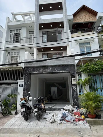 Bán nhà MT đường số 51 p tân quy . dt 4x20m 1 trệt 3 lầu , thang máy , nhà mới đẹp .sh