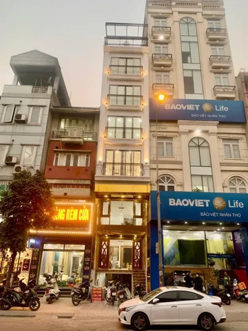 BÁN TÒA NHÀ MẶT ĐƯỜNG NGUYỄN XIỂN. 100M2 - 8 TẦNG, THANG MÁY. KINH DOANH.