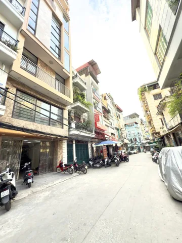 BÁN TÒA NHÀ MẶT PHỐ THỊNH QUANG. 100M2 XÂY 9 TẦNG. THANG MÁY. GARA Ô TÔ.