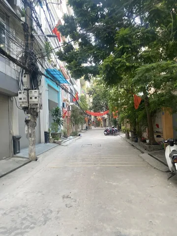 BÁN NHÀ MẶT NGÕ Ô TÔ TRÁNH ĐƯỜNG TÂN MAI. 50M2 XÂY 8 TẦNG. THANG MÁY.
