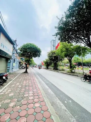 BÁN NHÀ MẶT ĐƯỜNG KHƯƠNG ĐÌNH. 65M2 XÂY 7 TẦNG. THANG MÁY. VỈA HÈ RỘNG.