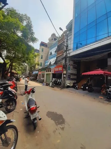 BÁN TÒA NHÀ MẶT PHỐ TRẦN QUỐC VƯỢNG – CẦU GIẤY130m² – LÔ GÓC – 8 TẦNG THANG MÁY – MT 10M – GIÁ 75 TỶ