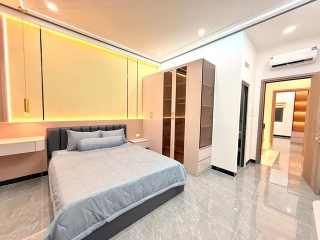 Bán nhà hẻm ô tô 197 Thạnh Lộc 15 An Phú Đông, DT 4x14m, nhà mới full nội thất, 4PN, gần chợ Cầu Đồng