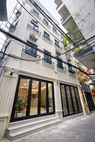 Bán nhà dòng tiền thang máy Ngã Tư Sở! 8 phòng studio khép kín – 53m2 x 6 tầng chỉ 11.38 tỷ – Giữ tài sản an toàn, lợi nhuận bền vững
