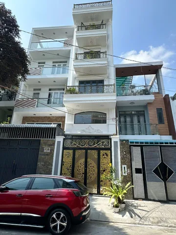 nhà 5 lầu + thang máy 4x19m đường 79 phường Tân quy Quận 7