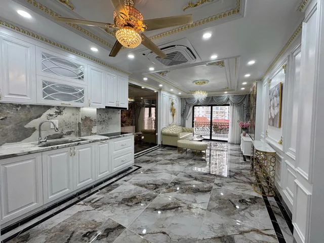 BÁN TÒA NHÀ ĐƯỜNG NGUYỄN DỨC CẢNH. 70M2 - 7 TẦNG. THANG MÁY. GARA Ô TÔ.