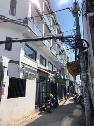 Bán nhà góc hai mặt tiền hẻm xe hơi,Phú Mỹ,quận 7.