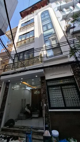 BÁN NHÀ ĐƯỜNG CHÙA BỘC. 50M2 XÂY 7 TẦNG. THANG MÁY.