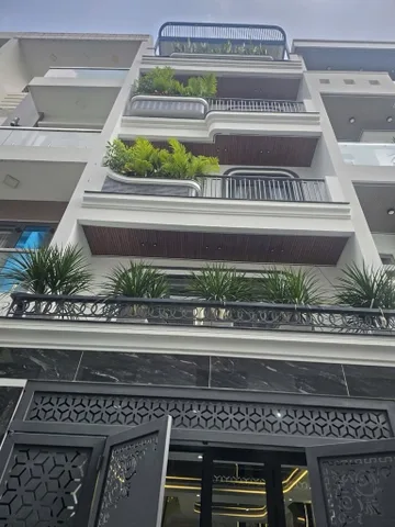 Nhà bán phạm văn chiêu 5 tầng sổ hồng riêng, nhà mới ở ngay.