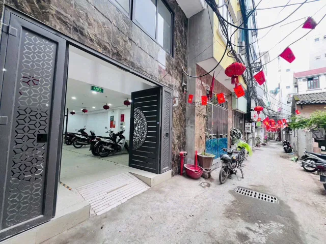BÁN TÒA NHÀ CHDV ĐƯỜNG LÊ QUANG ĐẠO. 7 TẦNG. THANG MÁY. 27 PHÒNG KHÉP KÍN.
