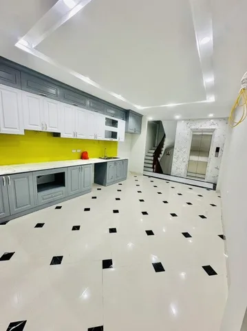 Bán nhà Định Công Thượng – Giá 14.6 tỷ – DT 55m² x 7 tầng – MT 4m – thang máy, ngõ rộng, sân lớn