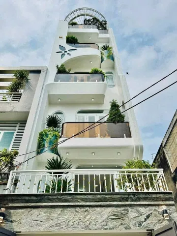 Nhà xây mới có thang máy full nội thất đường 6m thông lê Văn Thọ Gò Vấp