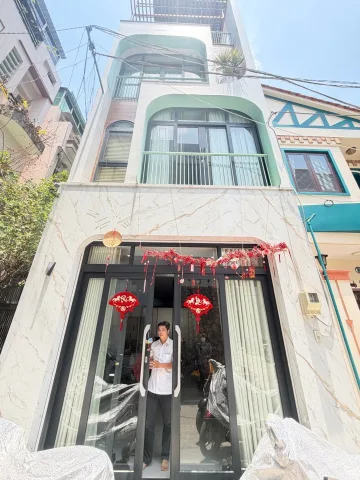 Nhà bán nguyễn kiệm 4 tầng hẽm xe hơi, gần san bay