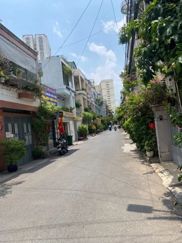 Nhà bán nguyễn xí 4 tầng hẽm xe hơi thông, gần bờ kênh