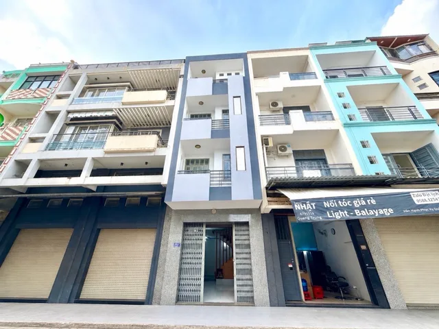 Nhà bán quang trung ngay chợ hạnh thông, mặt tiền kinh doanh