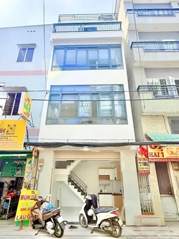 Nhà đẹp 4 tầng mặt tiền khu VIP K300, chợ Hoàng Hoa Thám, Đồng Xoài - Đường 10m, KD đỉnh - 5.x tỷ