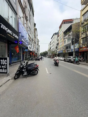 BÁN TÒA NHÀ MẶT PHỐ CHÙA LÁNG, ĐỐNG ĐA, 120M2, 9 TẦNG THANG MÁY, THÔNG SÀN, DÒNG TIÊN SẴN