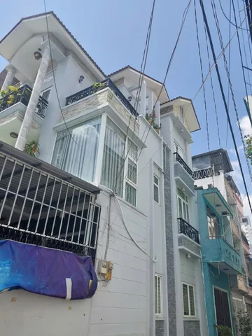 Bán Nhà Góc 2 Mt hẻm 30 Lâm Văn bền ( lg 14m) Dt: 5,4x13m 1 trệt 3 lầu. Giá 12,5 tỷ